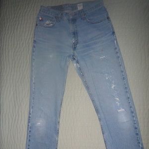 Men's 505 Levi's. Distressed, early 80's vintage. 30W x 36L